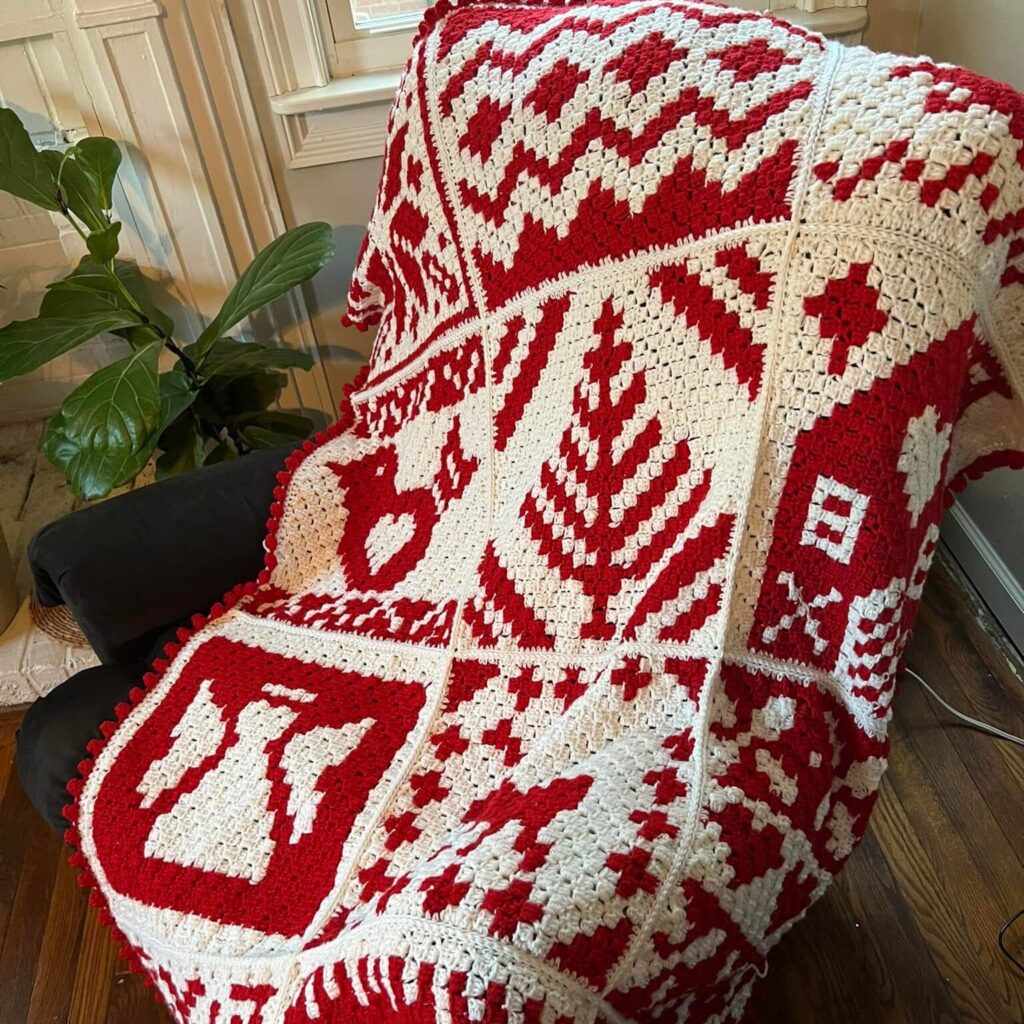 Red and White Christmas blanket crocheted in a Nordic style using C2C afghan squares