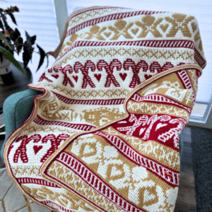 Beautiful mosaic crochet gingerbread blanket with festive patterns and warm colors.
